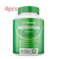 Bottle of Meoed Moringa dietary supplement with green label on a white background